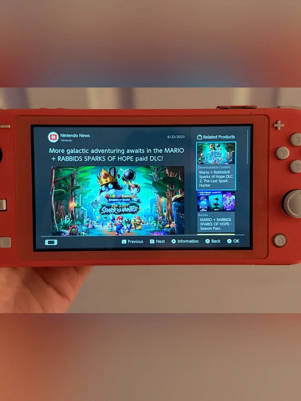 Nintendo Switch Lite Coral Handheld System 32GB Wi-Fi 720p USB-C Region Free